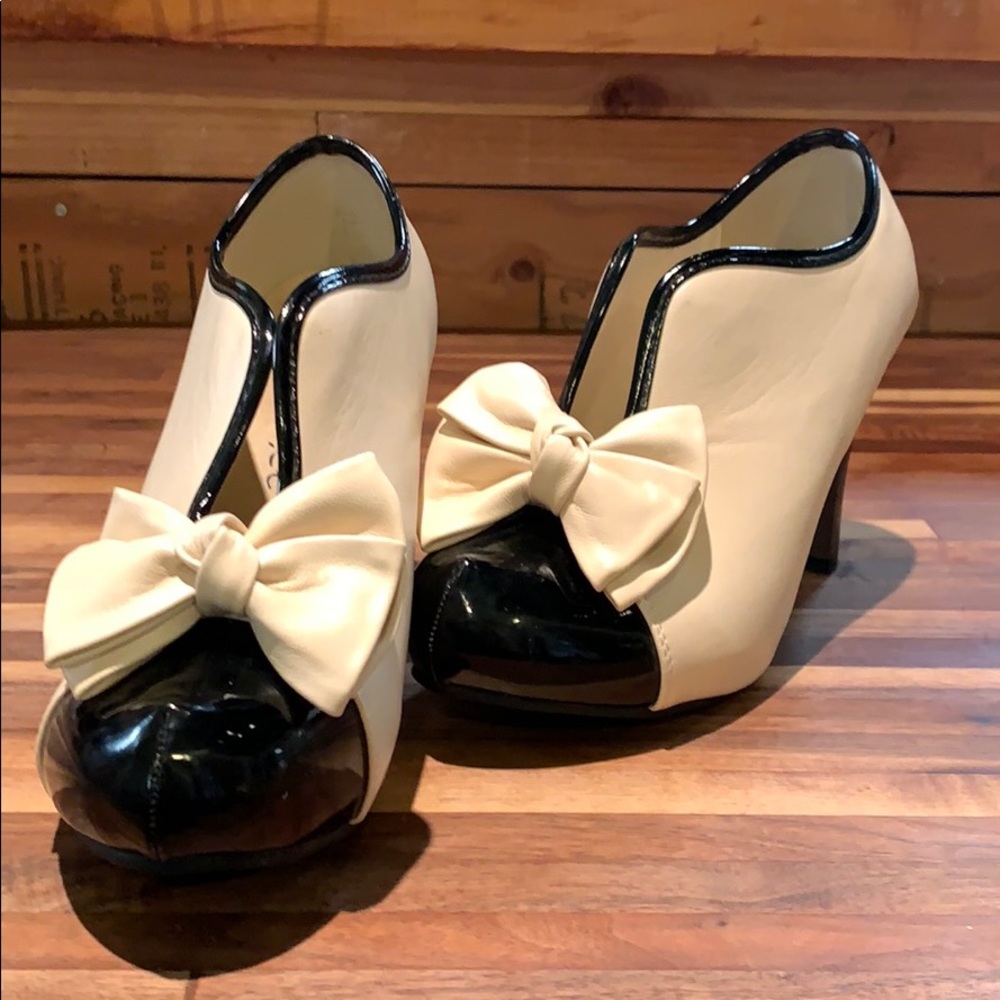 Manxixi ankle bootie heel